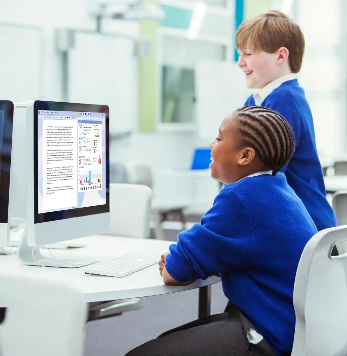 Students in classroom on a computer using the writing tool with AI Feedback